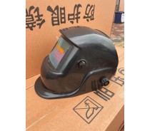 Auto-darkening face shield