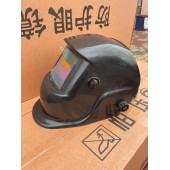 Auto-darkening face shield